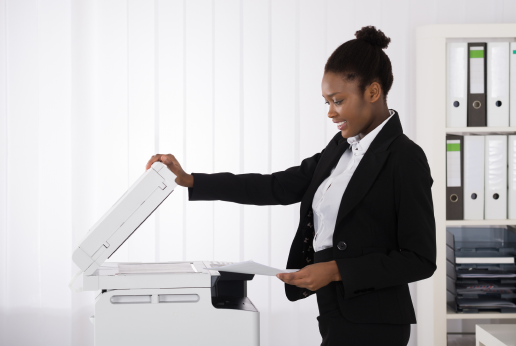 lady opening photocopy machine